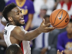 Georgia forward Yante Maten (1) loses position of the ball in the first half of an NCAA college basketball game against LSU in Athens, Ga., Saturday, Feb. 24, 2018.