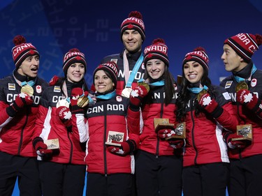 Scott Moir, Tessa Virtue, Meagan Duhamel, Eric Radford, Kaetlyn Osmond, Gabrielle Daleman, and Patrick Chan, Feb. 12, 2018.