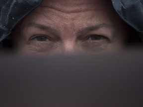 A former RCMP officer who was sent, in the late '80s, for a required physical exam as part of her application process with the force, is seen in Halifax on Thursday, Feb. 1, 2018. The woman, who was accepted into the force but is now retired, is one of more than 60 men and women to file complaints with the Halifax Regional Police over allegations the doctor sexually assaulted them at the RCMP health services office.