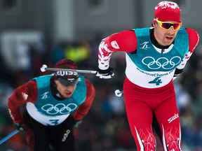 Alex Harvey (4) of Canada competes in the men's 15km + 15km Skiathlon during the Olympic Winter Games in Pyeongchang.