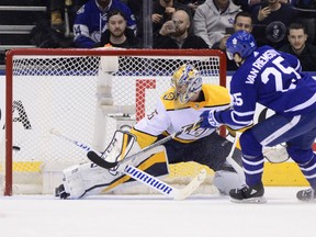 James van Riemsdyk of the Maple Leafs scores the game-winning shootout goal on Nashville Predators goaltender Pekka Rinne during their contest in Toronto on Wednesday night.