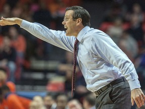 Nebraska coach Tim Miles yells instructions from the bench during the first half of an NCAA college basketball game against Illinois in Champaign, Ill., on Sunday, Feb. 18, 2018.