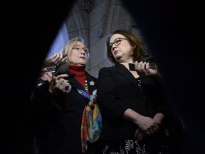 Minister of Crown-Indigenous Relations and Northern Affairs Carolyn Bennett, left, and Minister of Indigenous Services Jane Philpott speak to reporters after meetings with the family of Colten Boushie, in the Foyer of the House of Commons on Parliament Hill in Ottawa on Monday, Feb. 12, 2018.