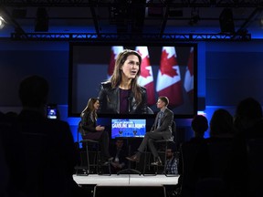 Ontario PC Party leadership candidate Caroline Mulroney participates in a Q&A with columnist Anthony Furey, right, at the Manning Networking Conference in Ottawa on Friday, Feb. 9, 2018.