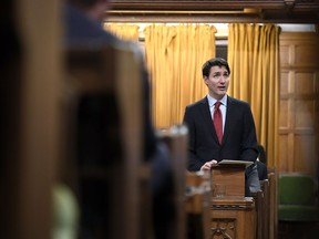 Prime Minister Justin Trudeau looks towards the gallery, where the family of Colten Boushie watch as he delivers a speech on the recognition and implementation of Indigenous rights in in the House of Commons on Parliament Hill in Ottawa on Wednesday, Feb. 14, 2018.
