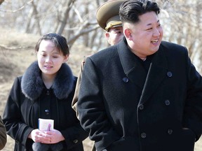 This 2015, file photo provided by the North Korean government shows North Korean leader Kim Jong Un and his sister Kim Yo Jong, left, during their visit to a military unit in North Korea.