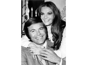 FILE - In this April 23, 1972 file photo, actor Robert Wagner and his former wife, actress Natalie Wood, pose at the Dorchester Hotel in London, England. Investigators are now calling Wagner a "person of interest" in the 1981 death of his wife Natalie Wood. Mystery has swirled around Wood's death. It was declared an accident but police reopened the case in 2011 to see whether Wagner or anyone else played a role