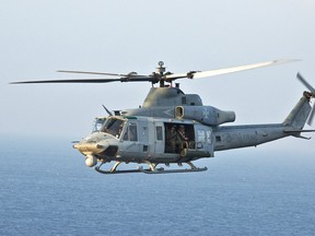 This Nov. 9, 2017 photo provided by the U.S. Marine Corps shows a UH-1Y Venom helicopter en route to Camp Schwab on Okinawa, in Japan. It's the same type helicopter whose tail rotor blade struck a sailor at Camp Pendleton Marine Corps base north of San Diego. The incident happened Wednesday evening, Feb. 21, 2018, and the sailor is in critical condition. The military says no other details, including the sailor's identity, are being released at this time.