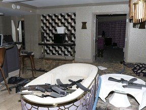 FILE - This Oct. 2017 file photo released by the Las Vegas Metropolitan Police Department Force Investigation Team Report shows the interior of Las Vegas shooter Stephen Paddock's 32nd floor room of the Mandalay Bay hotel. An autopsy found Las Vegas shooter Stephen Paddock had anti-anxiety drugs in his system but was not under the influence of them and was otherwise healthy. The report released Friday, Feb. 9, 2018, showed signs of benzodiazepines in Paddock's system but said because the substances were found in his urine and not his blood, Paddock wasn't under the influence of the medication. It said he was overweight but otherwise healthy. Paddock killed 58 people and injured more than 800 others during the Oct. 1 massacre.