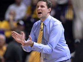 LSU coach Will Wade applauds during the team's NCAA college basketball game against Vanderbilt on Tuesday, Feb. 20, 2018, in Baton Rouge, La.