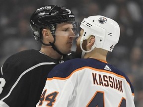 Los Angeles Kings defenseman Dion Phaneuf, left, and Edmonton Oilers right wing Zack Kassian face off during the first period of an NHL hockey game, Saturday, Feb. 24, 2018, in Los Angeles.