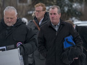 Defence attorney Scott Spencer, left, and his client Gerald Stanley enter the Court of Queen's Bench on the fifth day of the trial of Stanley, the farmer accused of killing 22-year-old Indigenous man Colten Boushie, in Battleford, Sask., Monday, February 5, 2018.