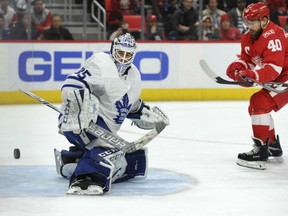 Toronto Maple Leafs' goaltender Curtis McElhinney denies Henrik Zetterberg of the Detroit Red Wings during NHL action Sunday in Detroit. McElhinney had 27 saves as the Leafs prevailed 3-2 on an Auston Matthews goal with 31 seconds remaining.