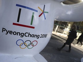 The official emblem of the 2018 Pyeongchang Games is seen in downtown Seoul, South Korea, Thursday, Feb. 1, 2018. In a rare sight, North Korean flags flew in South Korea on Thursday as the South prepared for the Winter Olympics that has brought a temporary lull in tensions surrounding the North's nuclear program.