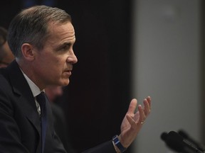 Bank of England Governor Mark Carney speaks during the central bank's quarterly inflation report press conference in the City of London, Thursday Feb. 8, 2018. The British pound has risen sharply after the Bank of England indicated it could raise interest rates again as soon as May.