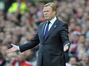 FILE -  In this file photo dated Sunday, Sept. 17, 2017, Everton manager Ronald Koeman gestures during the English Premier League soccer match between Manchester United and Everton at Old Trafford in Manchester, England.  The Dutch Football Association on Tuesday Feb. 6, 2018, signed former Everton and Southampton coach Koeman to take charge of the struggling Netherlands national soccer team.