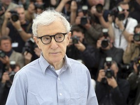 FILE - In this Wednesday, May 11, 2016, file photo, director Woody Allen poses for photographers during a photo call for the film Cafe Society, at the 69th international film festival, Cannes, southern France. Allen's French film distributor has defended the American director against sexual abuse claims, Saturday Feb. 3, 2018, saying he has been unfairly caught up in the fallout surrounding the #MeToo movement.