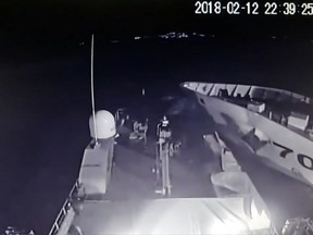 This still image taken from video aboard a Greek patrol boat obtained by the Associated Press on Feb. 17, 2018, shows a Turkish coastguard vessel at right, in the Aegean Sea on Feb. 12, 2018, during an incident where the two boats collided. (AP Photo)
