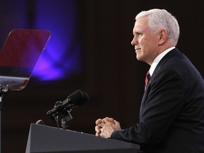 Vice President Mike Pence pauses as he speaks at the Conservative Political Action Conference (CPAC), at National Harbor, Md., Thursday, Feb. 22, 2018.  Pence said that in a meeting with governors at the White House Monday, they and Trump will "make the safety of our nation's schools and our students our top national priority."