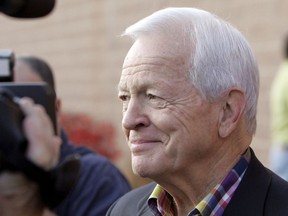 FILE- In a Nov. 4, 2008 file photo, then-U.S. Rep. Joe Knollenberg, R-Mich., talks to the media after voting in his precinct in Bloomfield Hills, Mich. Knollenberg, who served suburban Detroit's Oakland County for 16 years, has died. He was 84. State Sen. Marty Knollenberg said his father died Tuesday, Feb. 6, of complications from Alzheimer's disease. He died at a memory care facility in Troy, where had lived for 2 and a half years.