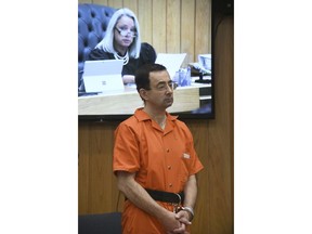Larry Nassar appears in the court of Judge Janice Cunningham for sentencing on Monday, Feb. 5, 2018 in Charlotte, Mich. Cunningham sentenced Nassar on Monday to between 40 and 125 years in prison for sexually abusing patients at an elite gymnastics club.