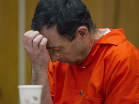 Larry Nassar appears for his sentencing at Eaton County Circuit Court in Charlotte on Wednesday, Jan. 31, 2018. The former Michigan State University sports-medicine and USA Gymnastics doctor is being sentenced for three first degree criminal sexual abuse charges related to assaults that occurred at Twistars, a gymnastics facility in Dimondale. Nassar has also been sentenced to 60 years in prison for three child pornography charges in federal court and between 40 to 175 years in Ingham County for seven counts of criminal sexual conduct.