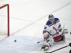 New York Rangers goalie Henrik Lundqvist, of Sweden, gives up a goal to Minnesota Wild center Eric Staal during the first period of an NHL hockey game Tuesday, Feb. 13, 2018 in St. Paul, Minn.