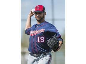 Minnesota Twins pitcher Anibal Sanchez (19) throws at baseball spring training in Fort Myers, Fla., Tuesday, Feb. 20, 2018.
