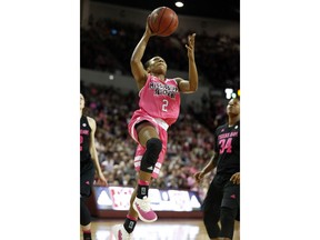 Mississippi State guard Morgan William (2) attempts a layup against Texas A&M in the first half of an NCAA college basketball game in Starkville, Miss., Sunday Feb. 18, 2018.