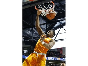 Tennessee forward Admiral Schofield (5) watches his dunk against Mississippi during the first half of an NCAA college basketball game in Oxford, Miss., Saturday, Feb. 24, 2018.
