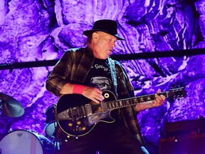 Neil Young performs during 2017 Farm Aid on Sept.16, 2017, in Burgettstown, Pa.