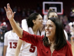 Nebraska coach Amy Williams winks as she waves in the direction of fans, following the team's 62-47 win over Illinois in an NCAA college basketball game in Lincoln, Neb., Thursday, Feb. 1, 2018. Nebraska has won five straight and eight of its last nine.