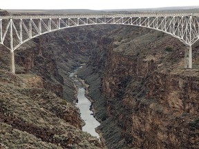 FILE - In this March 29, 2005 file photo, the Taos Gorge Bridge is seen near Taos N.M. New Mexico lawmakers are pushing a measure aimed at curbing suicides at the Rio Grande Gorge Bridge.
