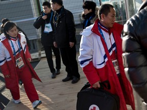 Members of the Unified Korea team from North Korea arrive at the Gangneung Olympic Village.