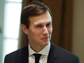 FILE - In this Wednesday, May 3, 2017, file photo, White House senior adviser Jared Kushner listens during a meeting with Palestinian leader Mahmoud Abbas at the White House, in Washington. The family real estate company once run by presidential adviser Jared Kushner is shifting a federal court case to a new venue so it won't have to reveal the identities of foreign partners behind some of its real estate projects. With a deadline approaching within hours, the Kushner Cos. filed papers in federal court Friday, Feb. 9, 2018 to move the case involving Maryland apartment complexes it owns with foreign investors back to state court.