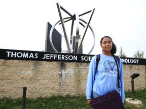 In this Sept. 11, 2017 photo, Alina Ampeh, a student at Thomas Jefferson High School for Science and Technology in the Alexandria section of Fairfax County, Va., speaks to an Associated Press reporter in front of her school.