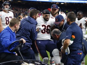 FILE - In this Oct. 29, 2017, file photo, Chicago Bears tight end Zach Miller (86) is placed on a cart after injuring his leg in the second half of an NFL football game against the New Orleans Saints in New Orleans. For the Super Bowl, there is an Emergency Action Plan, an exhaustive outline that describes who does what in virtually every case of injury or emergency. It's so detailed that it includes arm or hand signals to help all involved determine what action is needed. "The collaborative effort between teams is where it should be ... seamless and flawless," said Vikings head athletic trainer Eric Sugarman. The emphasis, of course, is on immediate treatment whenever an injury occurs. The hour-long meeting's value became apparent when Miller dislocated his left knee and tore an artery that supplies blood to the lower leg. Miller could have lost the leg had it not been for the quick action by the well-schooled medical staffs.
