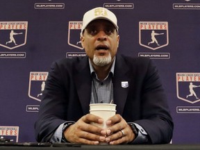 FIEL - In this Feb. 19, 2017, file photo, Tony Clark, executive director of the Major League Players Association, answers questions at a news conference in Phoenix. Clark sadi Tuesday, Feb. 6, 2018, that the number of rebuilding teams and unsigned free agents in a historically slow market "threatens the very integrity of our game." Just 53 of 166 players who exercised their free agency rights last November had announced agreements entering Tuesday, down from 99 of 158 at a similar time last year.