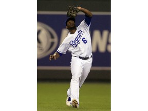 FILE - In this Sept. 26, 2017, file photo, Kansas City Royals center fielder Lorenzo Cain makes a catch during a baseball game against the Detroit Tigers at Kauffman Stadium in Kansas City, Mo.  The slick-fielding Cain and Christian Yelich improve the outfield defense, which should help the pitching staff.