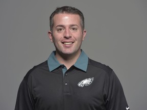 FILE - This is a 2017 file photo showing John DeFilippo of the Philadelphia Eagles NFL football team. The Minnesota Vikings have hired Philadelphia Eagles quarterbacks coach John DeFilippo as their offensive coordinator. DeFilippo replaces Pat Shurmur, who became head coach of the New York Giants. The deal was done Friday, Feb. 9, 2018, five days after the Eagles won the Super Bowl in Minnesota. (AP Photo/File)