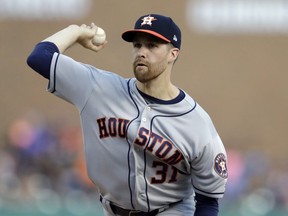 FILE - In this Saturday, July 29, 2017 file photo, Houston Astros starting pitcher Collin McHugh throws during the first inning of a baseball game against the Detroit Tigers in Detroit. Collin McHugh became the second pitcher on the World Series Houston Astros to go to salary arbitration, asking for a raise from $3.85 million to $5 million. Houston argued for a $4.55 million salary in a hearing, Tuesday, Feb. 13, 2018 before Mark Burstein, Jeanne Wood and Allen Ponak.