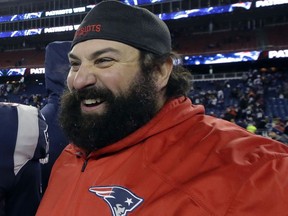FILE - In this Jan. 13, 2018, file photo, New England Patriots defensive coordinator Matt Patricia leaves the field after an NFL divisional playoff football game against the Tennessee Titans in Foxborough, Mass. The Detroit Lions have hired Patricia as their coach. The expected hiring came a day after the Patriots lost to the Philadelphia Eagles in the Super Bowl.