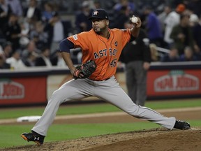 FILE - In this Oct. 18, 2017, file photo, Houston Astros relief pitcher Francisco Liriano throws during the eighth inning of Game 5 of baseball's American League Championship Series against the New York Yankees in New York. The Detroit Tigers have added depth to their pitching staff by agreeing to a $4 million, one-year contract with left-hander Liriano. The move was announced during the Tigers' spring training opener Friday, Feb. 23, 2018, against the Yankees.