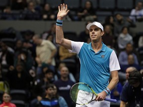 Sam Querrey celebrates after defeating Adrian Mannarino, of France, in their semifinals match at the New York Open tennis tournament in Uniondale, N.Y., on Saturday, Feb. 17, 2018.