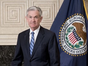 FILE- In this Feb. 5, 2018, file photo, Jerome Powell arrives to take the oath of office as Federal Reserve Board chair at the Federal Reserve in Washington. On Friday, Feb. 23, the Federal Reserve will issue its semi-annual monetary report to Congress, which its new chairman, Powell, will testify about on Capitol Hill next week.