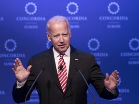 FILE- In this June 7, 2017, file photo, former U.S. Vice President Joe Biden speaks during a conference in Athens. Biden is tiptoeing toward a potential run in 2020, even broaching the possibility during a recent gathering of longtime foreign policy aides. Huddled his newly opened office steps from the U.S. Capitol, Biden opened a planning meeting for his new diplomacy center by addressing the elephant in the room. He said he was keeping his 2020 options open, considering it a real possibility.