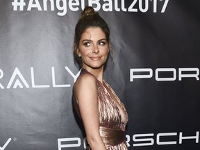 FILE - In this Oct. 23, 2017 file photo, Maria Menounos attends the Angel Ball in New York. Menounos believes in equal pay for equal work, but feels the situation with her former E! News colleague Catt Sadler is a bit more complicated. Sadler left the network late last year after learning that her on-air partner Jason Kennedy made nearly twice as much money as she did. She said she had to take a stand. While sympathetic, Menounos said simply paying everyone the same isn't always feasible. She cited NBA superstar LeBron James, who earns much more than many of his teammates.