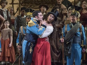 This Jan. 12, 2018 photo released by the Metropolitan Opera shows a performance of Donizetti's "L'Elisir d'Amore" ("The Elixir of Love") which will be broadcast to movie theaters worldwide on Saturday, Feb. 10, as part of the Met's Live in HD series. (Metropolitan Opera via AP)