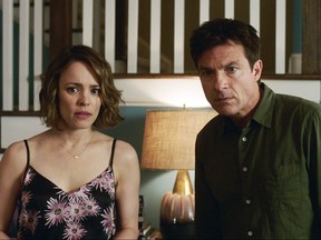 This image released by Warner Bros. Entertainment shows Rachel McAdams, left, and Jason Bateman in a scene from "Game Night." (Warner Bros. Entertainment via AP)