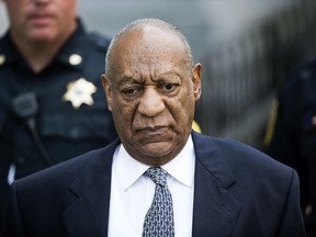 FILE - In this Aug. 22, 2017, file photo, Bill Cosby leaves Montgomery County Courthouse after a hearing in his sexual assault case in Norristown, Pa. Cosby's defense team says it wrongly accused prosecutors of hiding evidence from his suburban Philadelphia criminal sexual assault case. Cosby's lawyers acknowledged in a court filing Monday, Feb. 5, 2018, they'd made the headline-grabbing claim without realizing prosecutors told Cosby's former lawyer about interviewing a woman who cast doubt on his accuser.